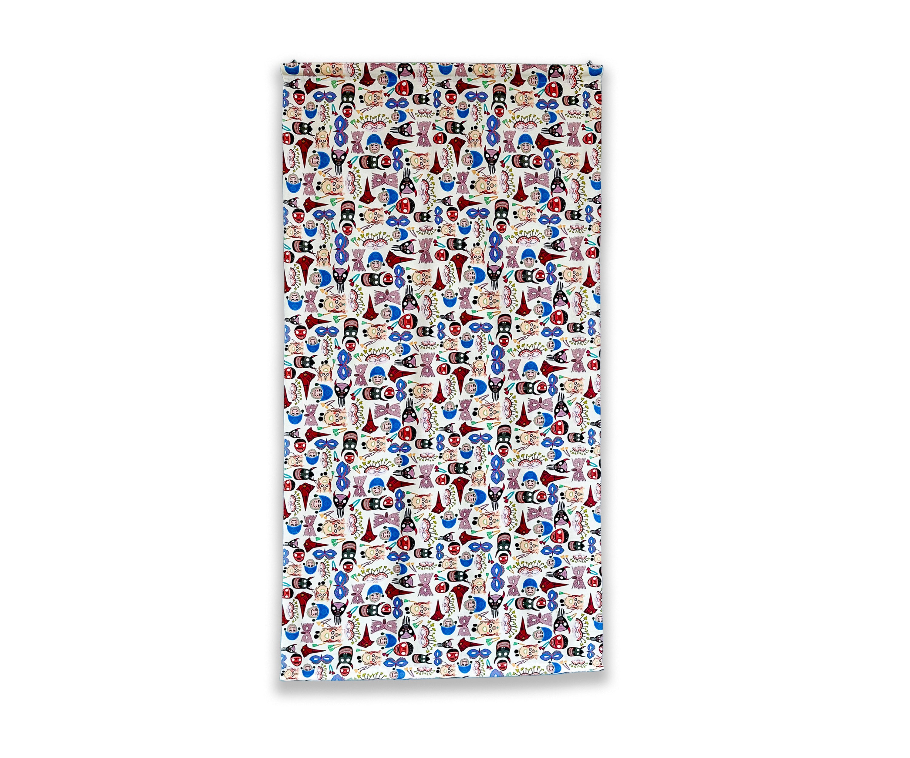 Patterned  wall hanging with colorful design on a white background