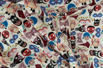 Load image into Gallery viewer, Patterned fabric with colorful masks and bows on a white background
