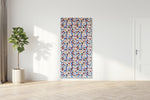 Load image into Gallery viewer, Colorful abstract painting on a white wall with a plant and door in the background
